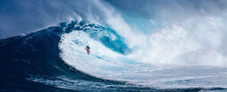 surfer surfing on big wave
